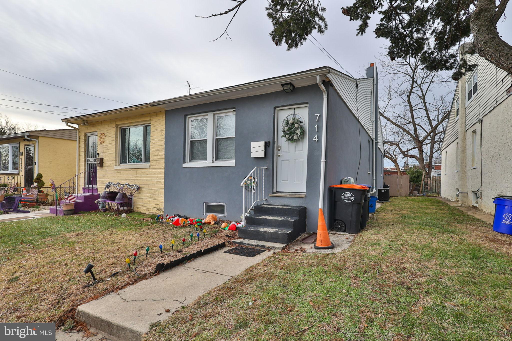 714 Ward Street Chester, PA 19013 - Photo 3 of 40 a view of a house with a yard