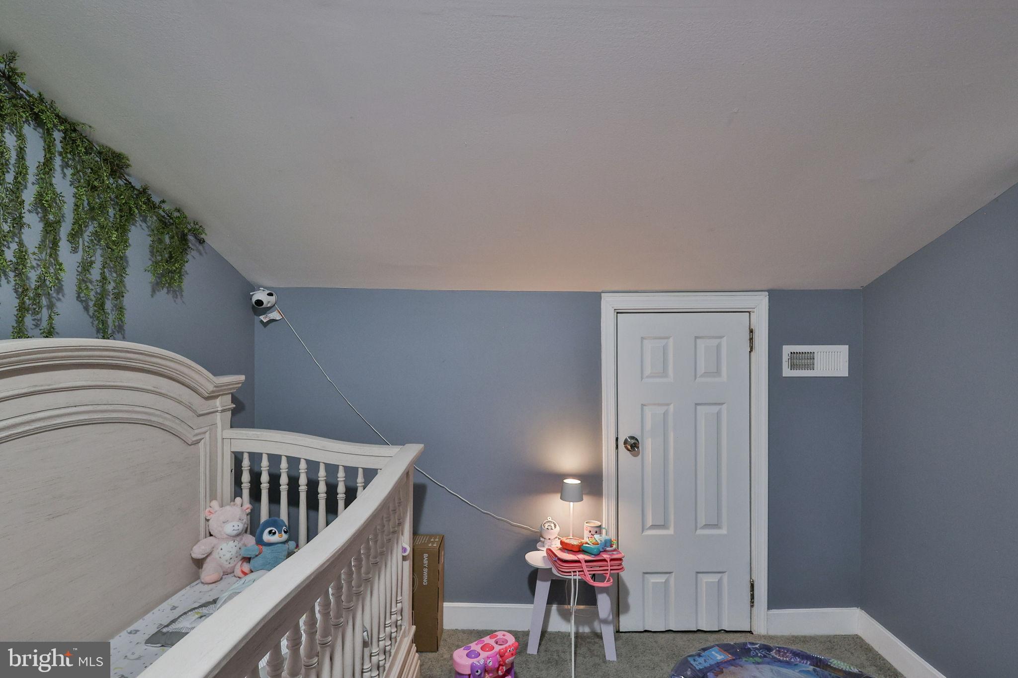 714 Ward Street Chester, PA 19013 - Photo 31 of 40 a view of a bedroom with wooden floor
