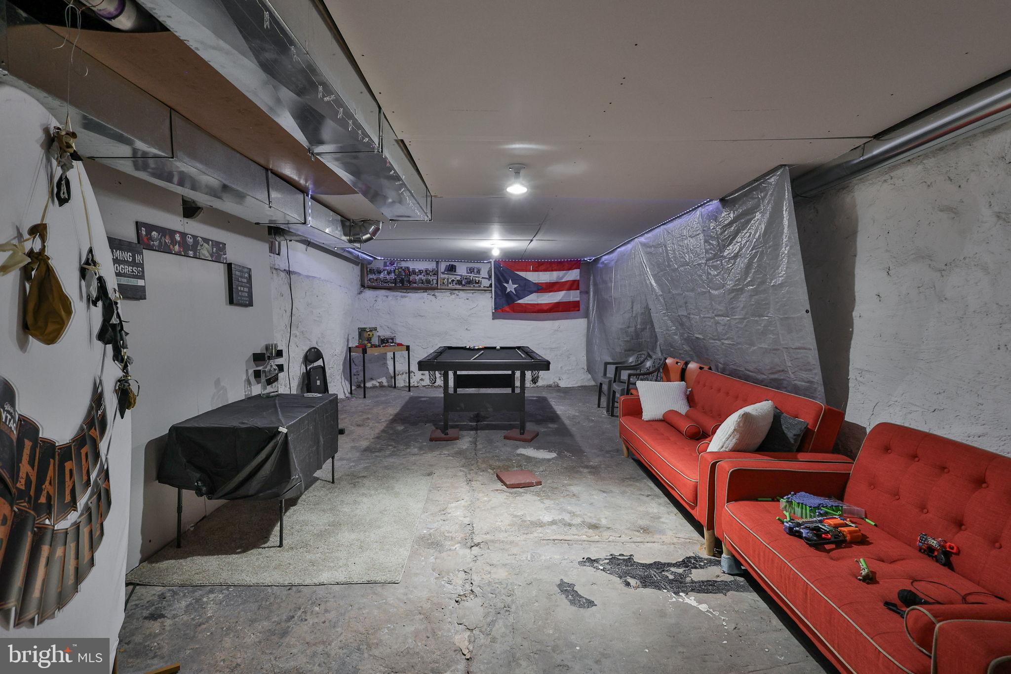 714 Ward Street Chester, PA 19013 - Photo 37 of 40 a garage with furniture