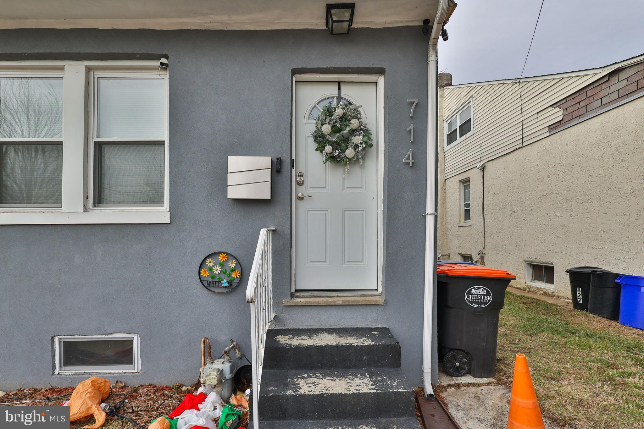 714 Ward Street Chester, PA 19013 - Photo 4 of 40 a front view of a house with outdoor space