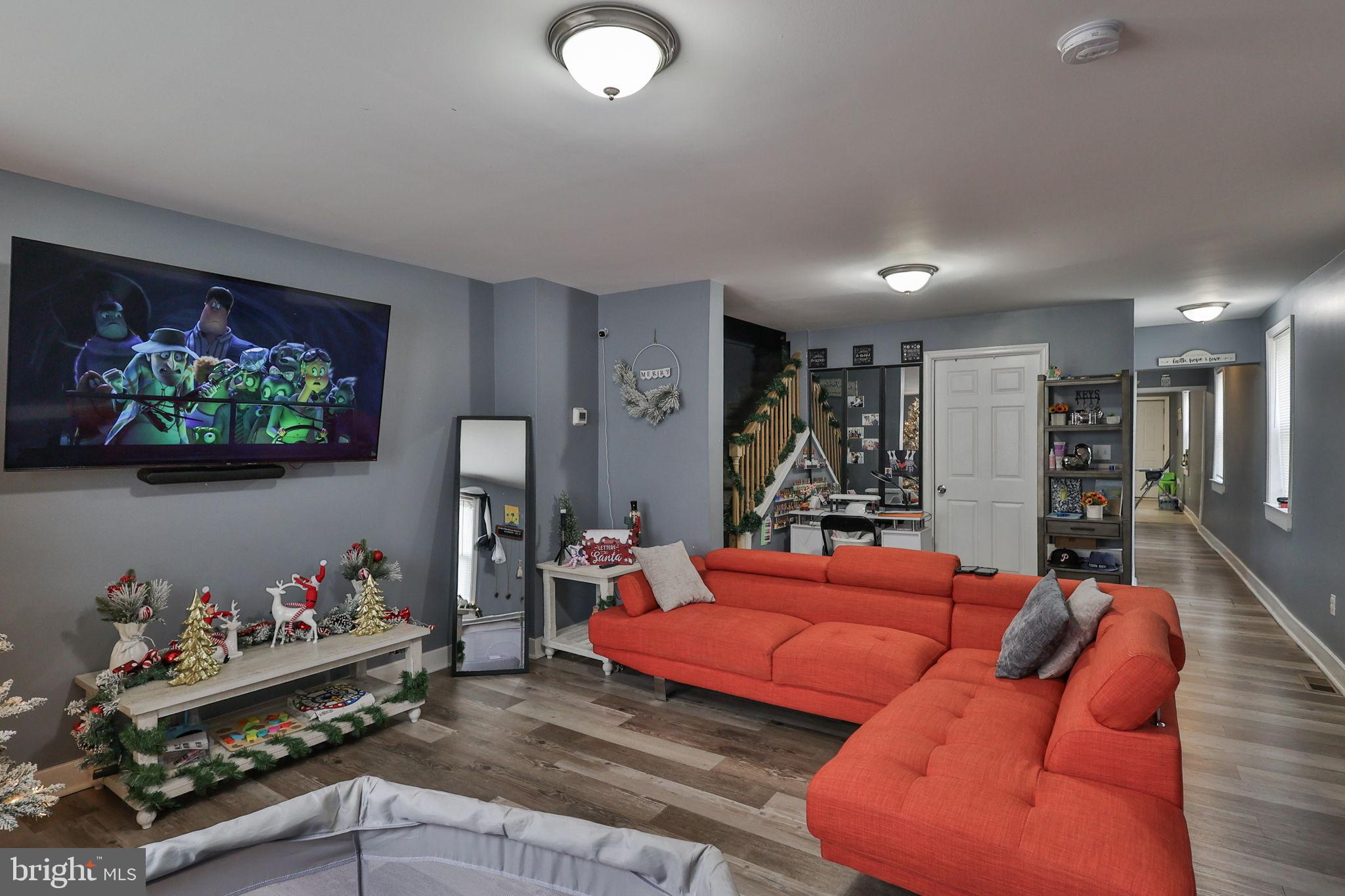 714 Ward Street Chester, PA 19013 - Photo 6 of 40 a living room with furniture and a couch
