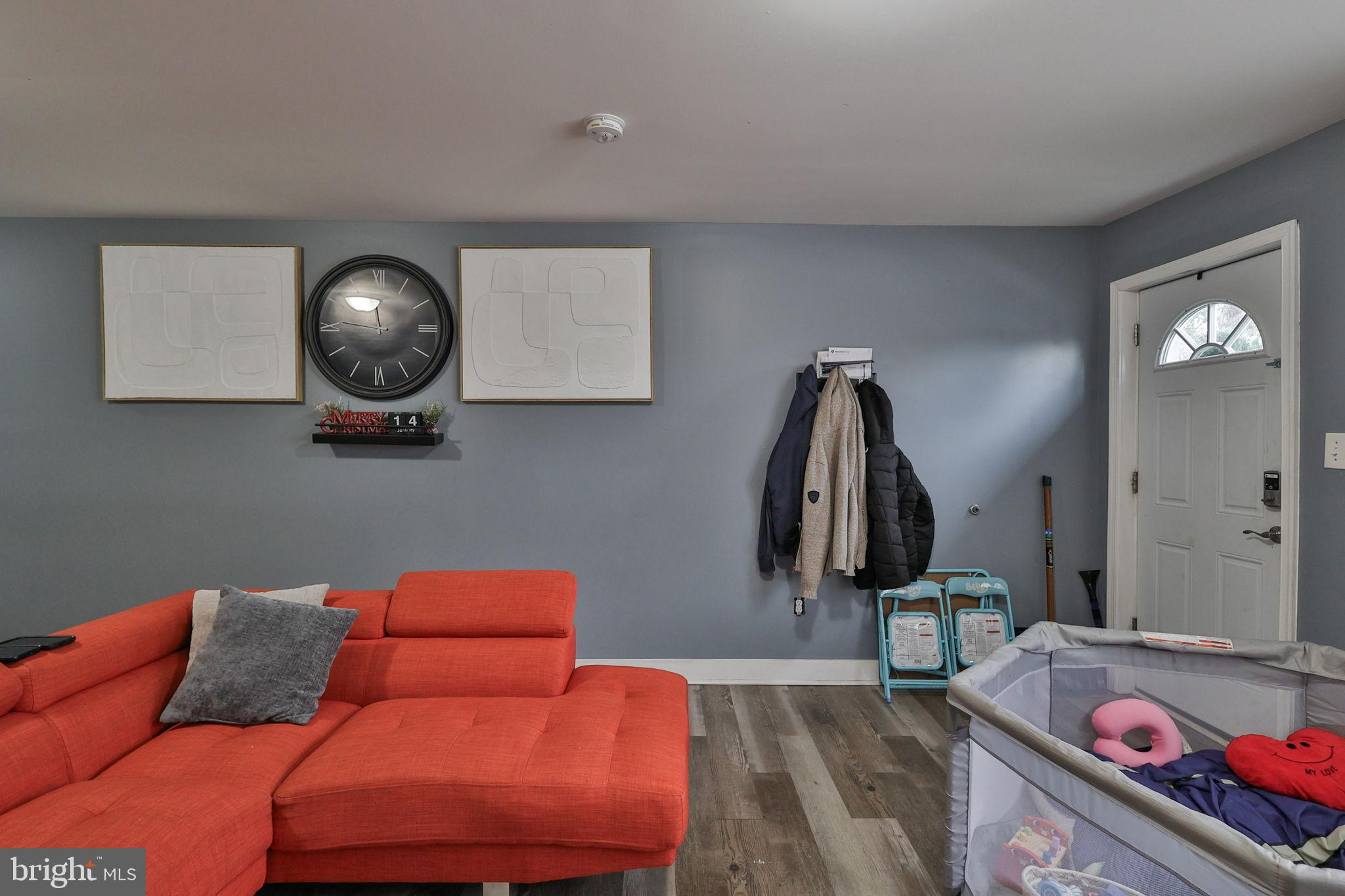714 Ward Street Chester, PA 19013 - Photo 8 of 40 a living room with furniture and a window