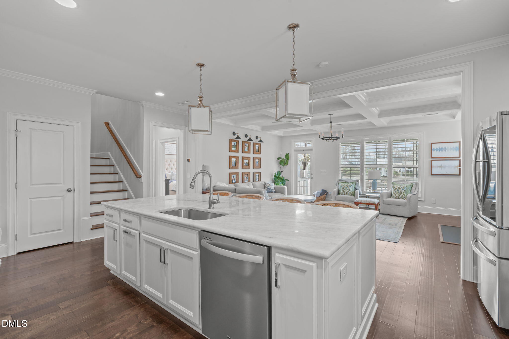 4144 Olde Judd Drive Willow Spring, NC 27592 - Photo 11 of 52 a kitchen with stainless steel appliances granite countertop a sink a stove and a wooden floors