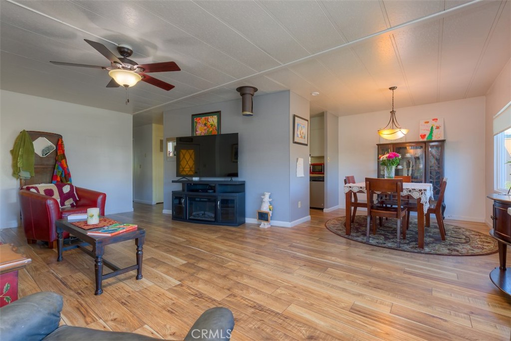 1901 Dayton Road, Unit 133 Chico, CA 95928 - Photo 7 of 36 a living room with furniture and a flat screen tv