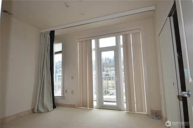 a view of outdoor space with sliding door and wooden floor