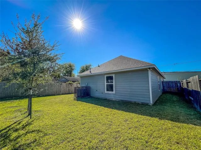 a view of a backyard with a garden