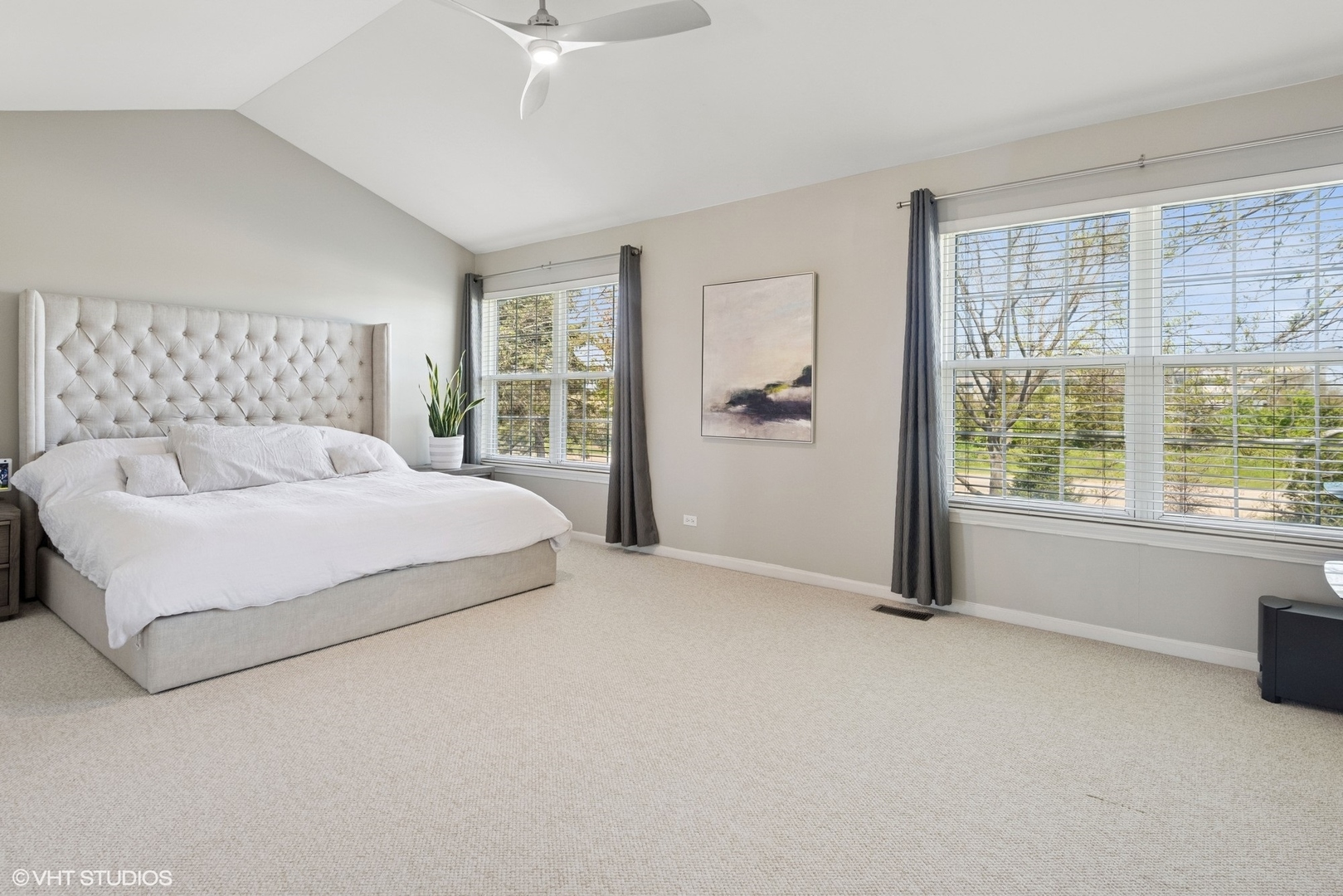 62 Andover Circle Northbrook, IL 60062 - Photo 12 of 23 a bedroom with a large bed and a large window