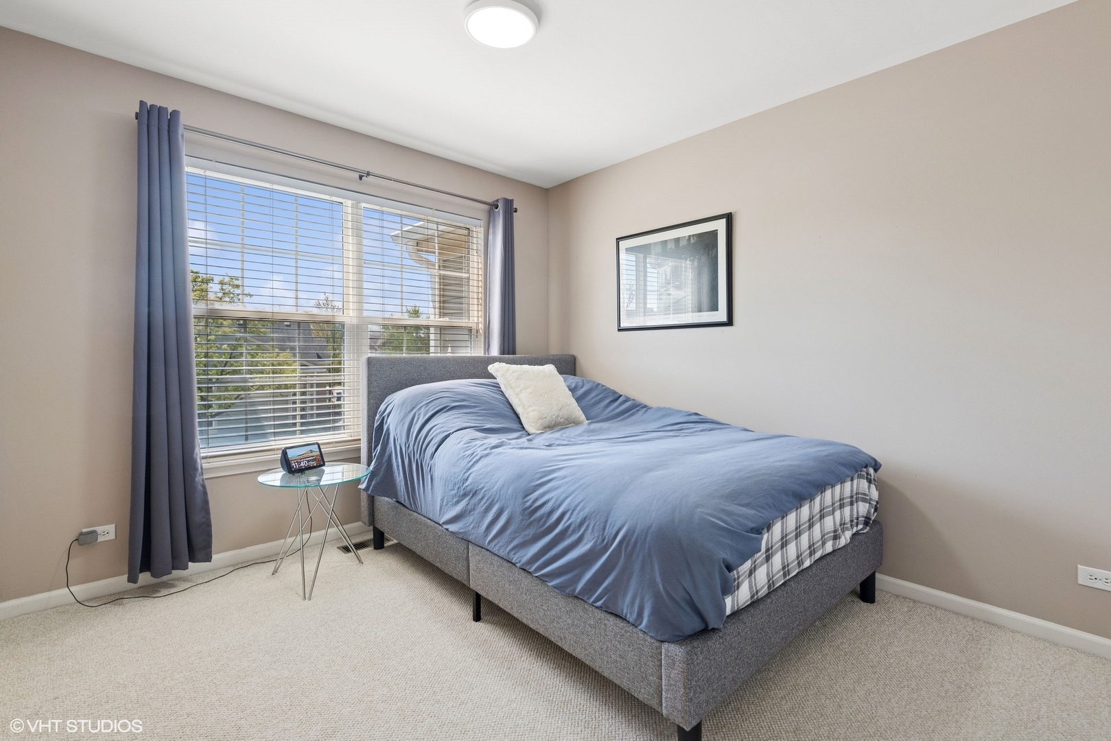 62 Andover Circle Northbrook, IL 60062 - Photo 14 of 23 a bedroom with a bed and glass window