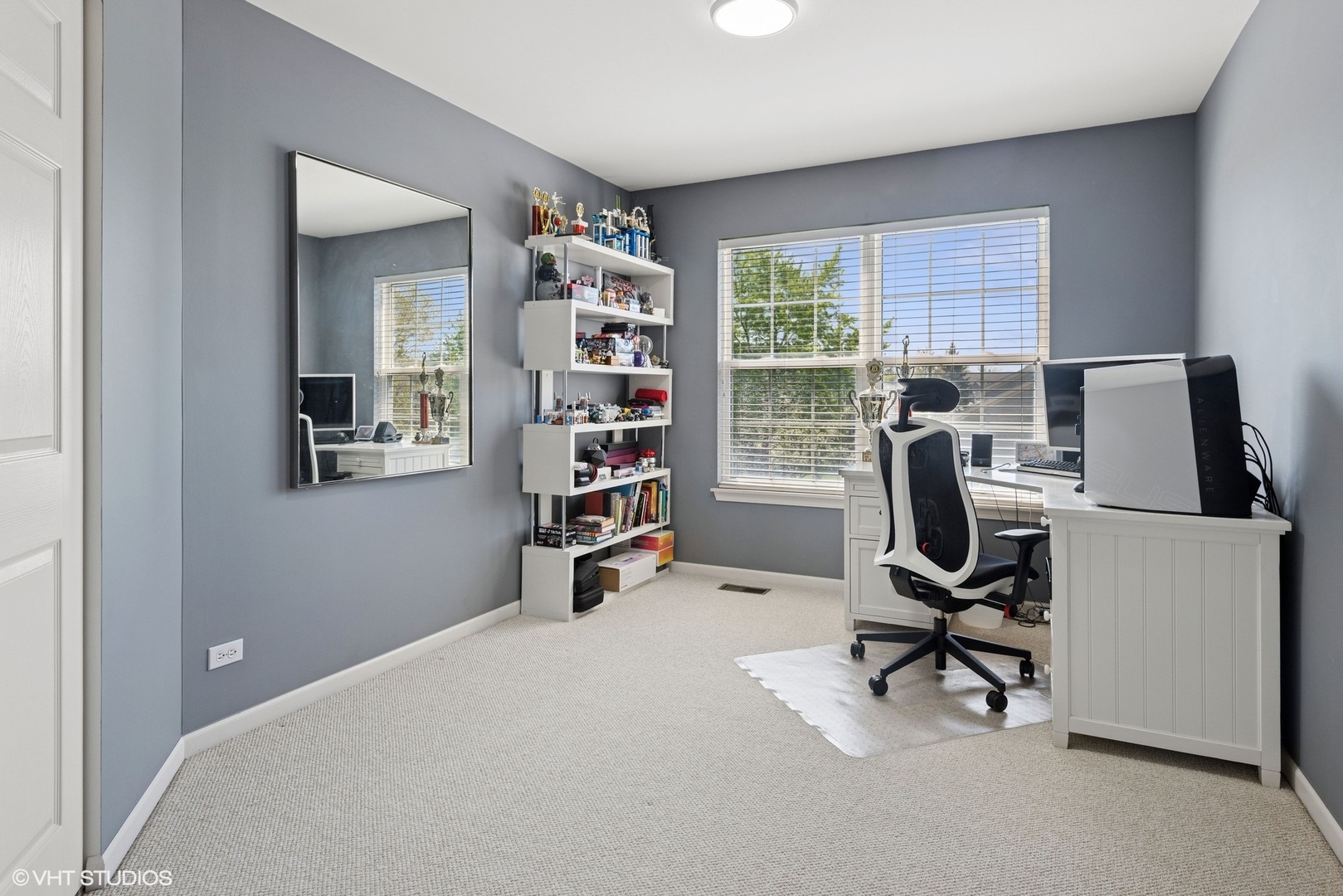 62 Andover Circle Northbrook, IL 60062 - Photo 15 of 23 a view of a workspace with furniture and a window