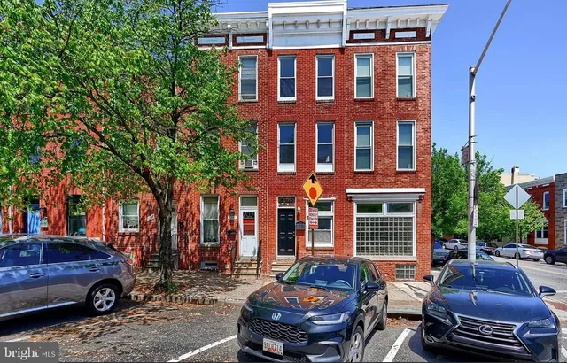 a car parked in front of a building