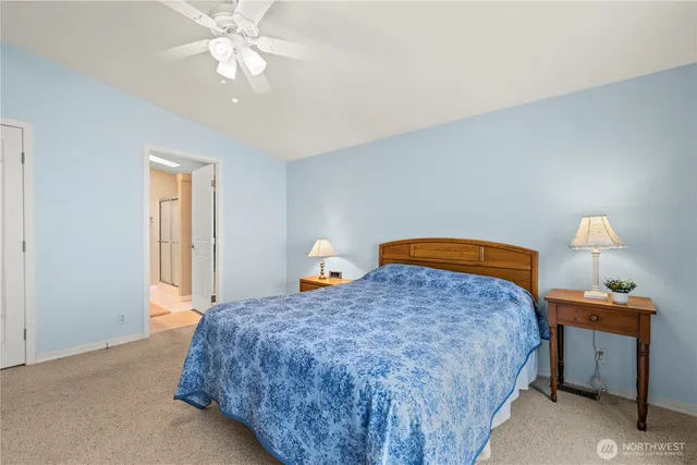 a bathroom with a sink double vanity and a mirror
