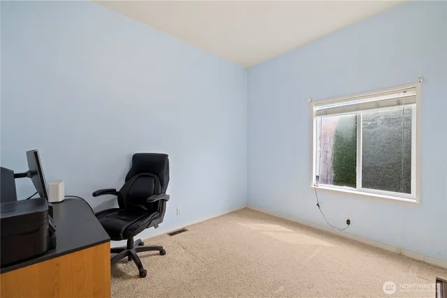 a bathroom with a toilet and a sink