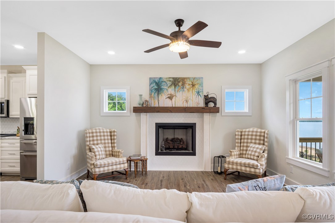 767 Sunken Meadow Road Spring Grove, VA 23881 - Photo 14 of 39 a living room with furniture and a fireplace