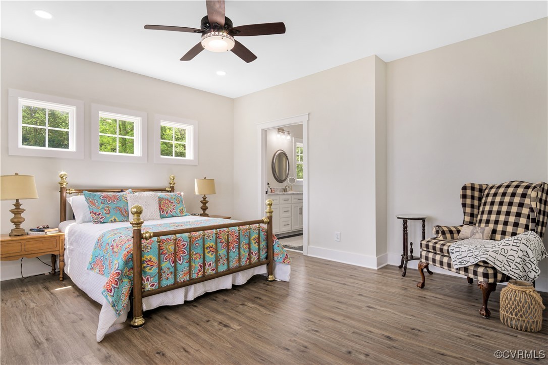 767 Sunken Meadow Road Spring Grove, VA 23881 - Photo 18 of 39 a bed room with a bed and a chair