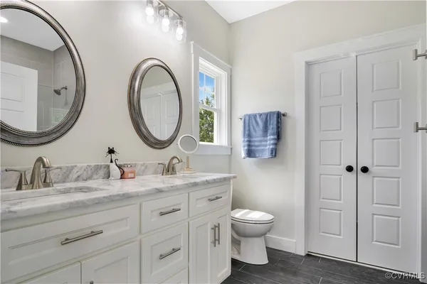 a view of an entryway with wooden floor