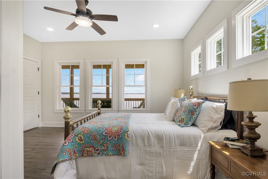 767 Sunken Meadow Road Spring Grove, VA 23881 - Photo 23 of 39 a bedroom with a bed and wooden floor