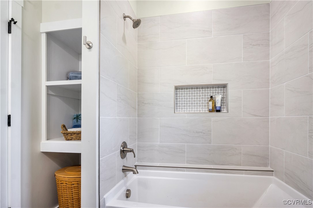 767 Sunken Meadow Road Spring Grove, VA 23881 - Photo 28 of 39 a bathroom with a tub