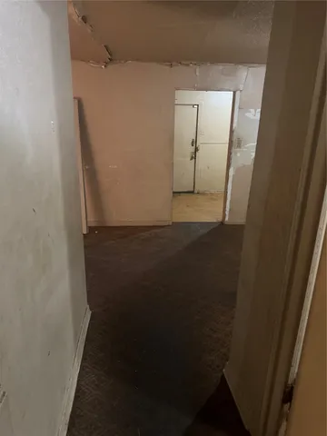 a view of house with backyard