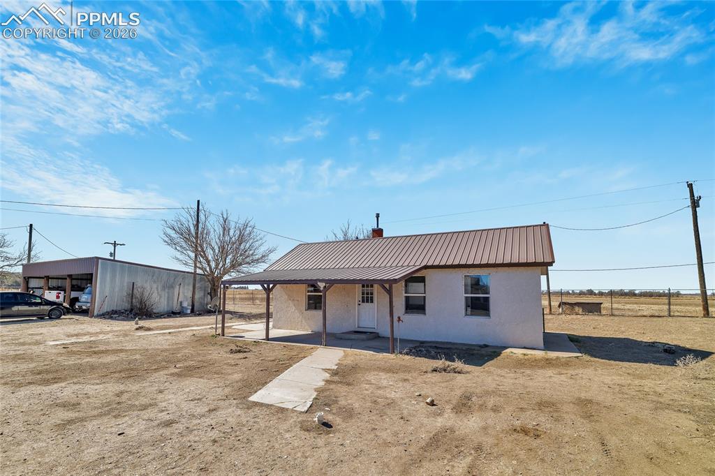 68300 Highway 50 Fowler, CO 81039 - Photo 42 of 49 ADU Unfurnished room with dark wood-style flooring and ceiling fan
