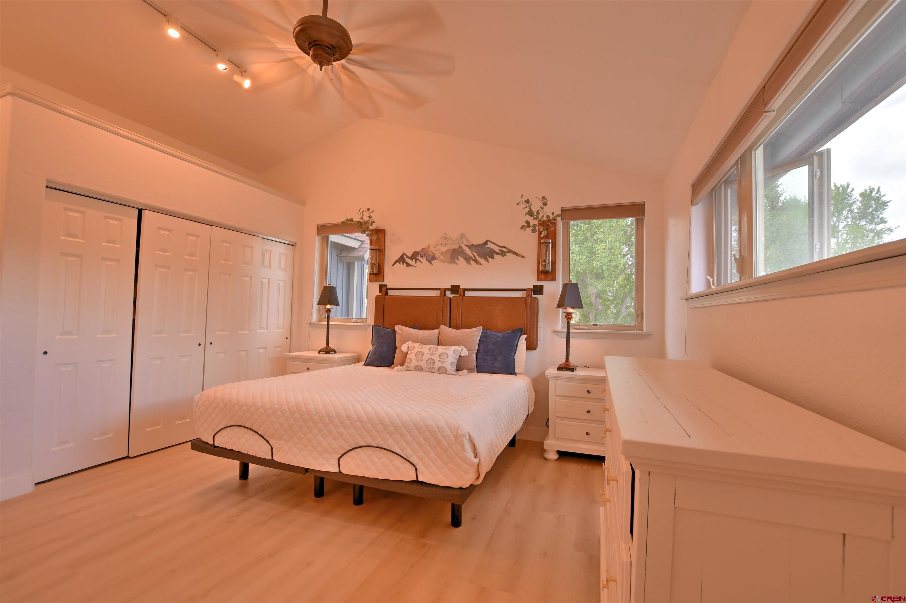 602 Chipeta Drive Ridgway, CO 81432 - Photo 14 of 41 a bedroom with a bed and window