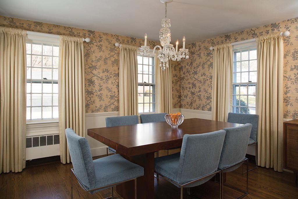 134 Annawan Road Newton, MA 02468 - Photo 3 of 8 a view of a dining room with furniture window and wooden floor