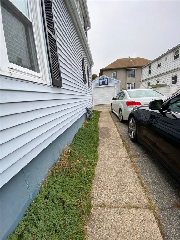 17 Jervis Street Woonsocket, RI 02895 - Photo 10 of 53 Walkway to back of house