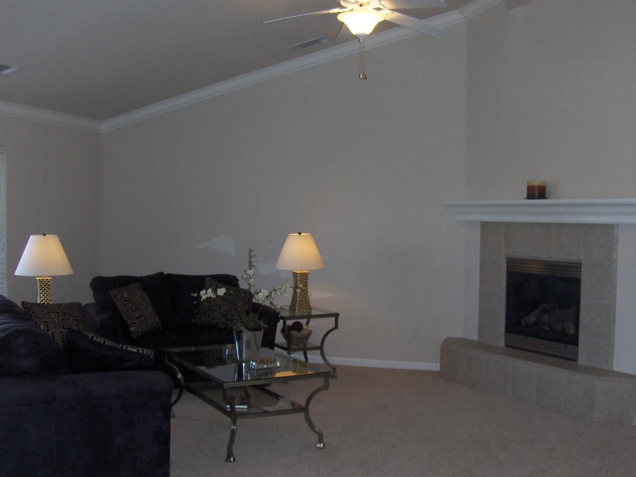 7642 Pit Road Redding, CA 96001 - Photo 3 of 18 a living room with furniture and a fireplace