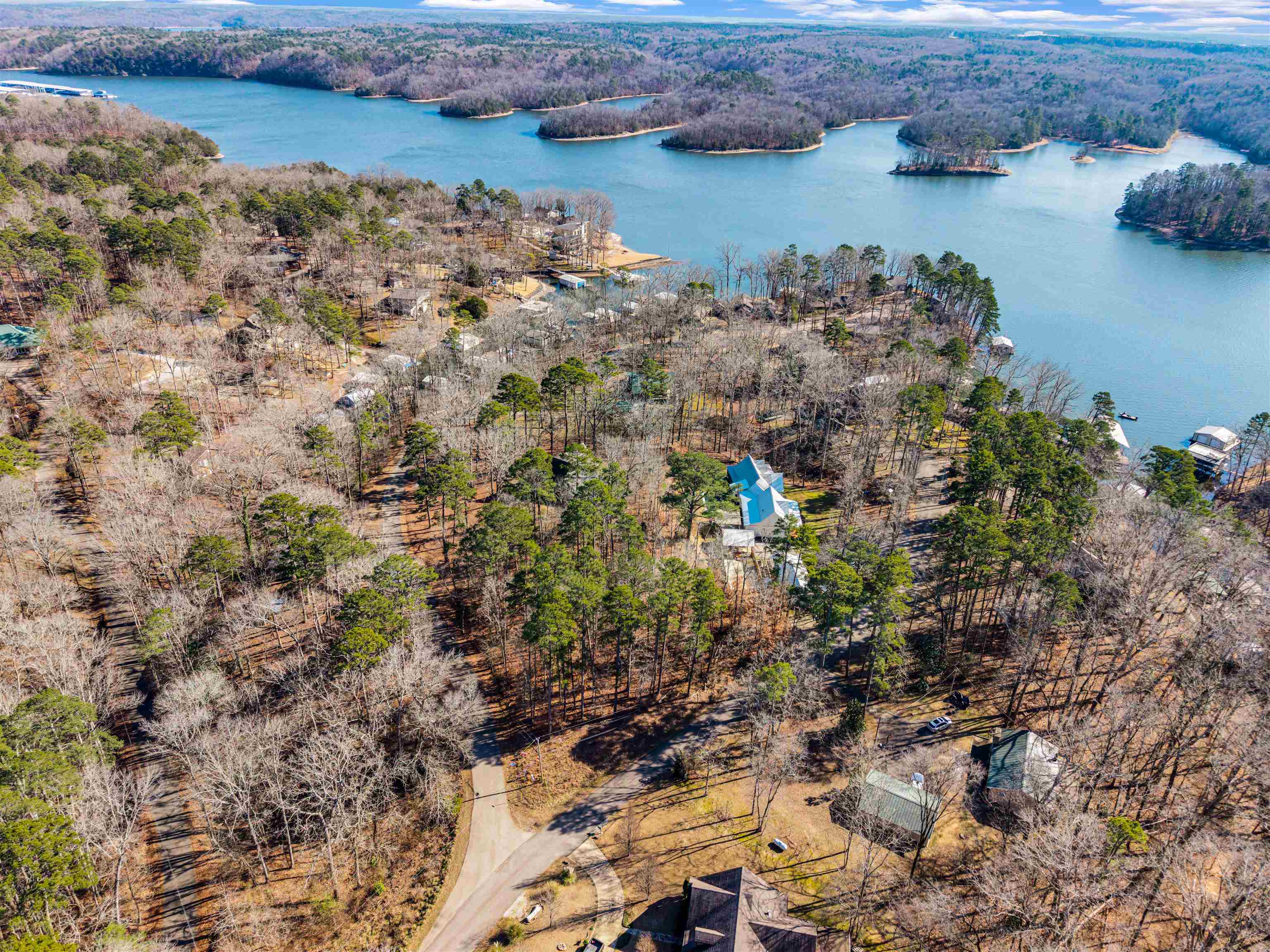 38 Cr 329 Road Iuka, MS 38852 - Photo 8 of 10 Aerial view of a nearby body of water and a heavily wooded area