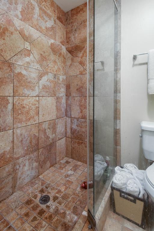1056 General George Patton Road, Unit 1056 Nashville, TN 37221 - Photo 20 of 30 a bathroom with a sink and a shower