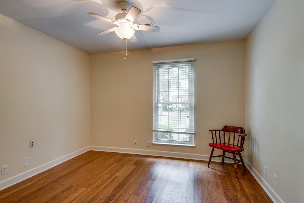 1056 General George Patton Road, Unit 1056 Nashville, TN 37221 - Photo 23 of 30 wooden floor in an empty room with a window