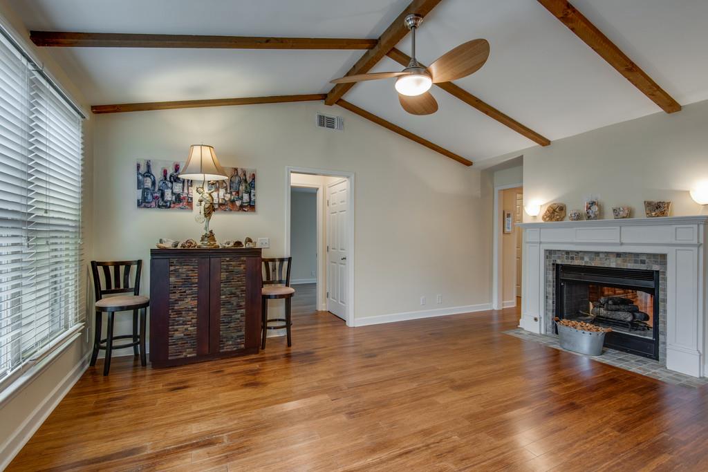 1056 General George Patton Road, Unit 1056 Nashville, TN 37221 - Photo 10 of 30 a view of a livingroom with furniture and a fireplace