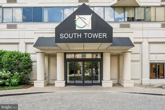 a view of a house with backyard sitting area and garden