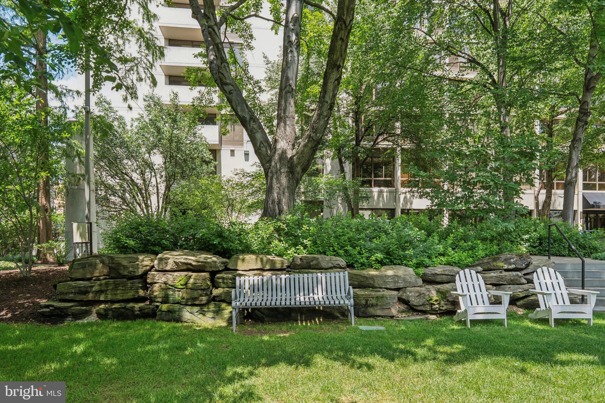 2001 Hamilton Street, Unit 1205 Philadelphia, PA 19130 - Photo 28 of 34 a view of a house with backyard sitting area and garden