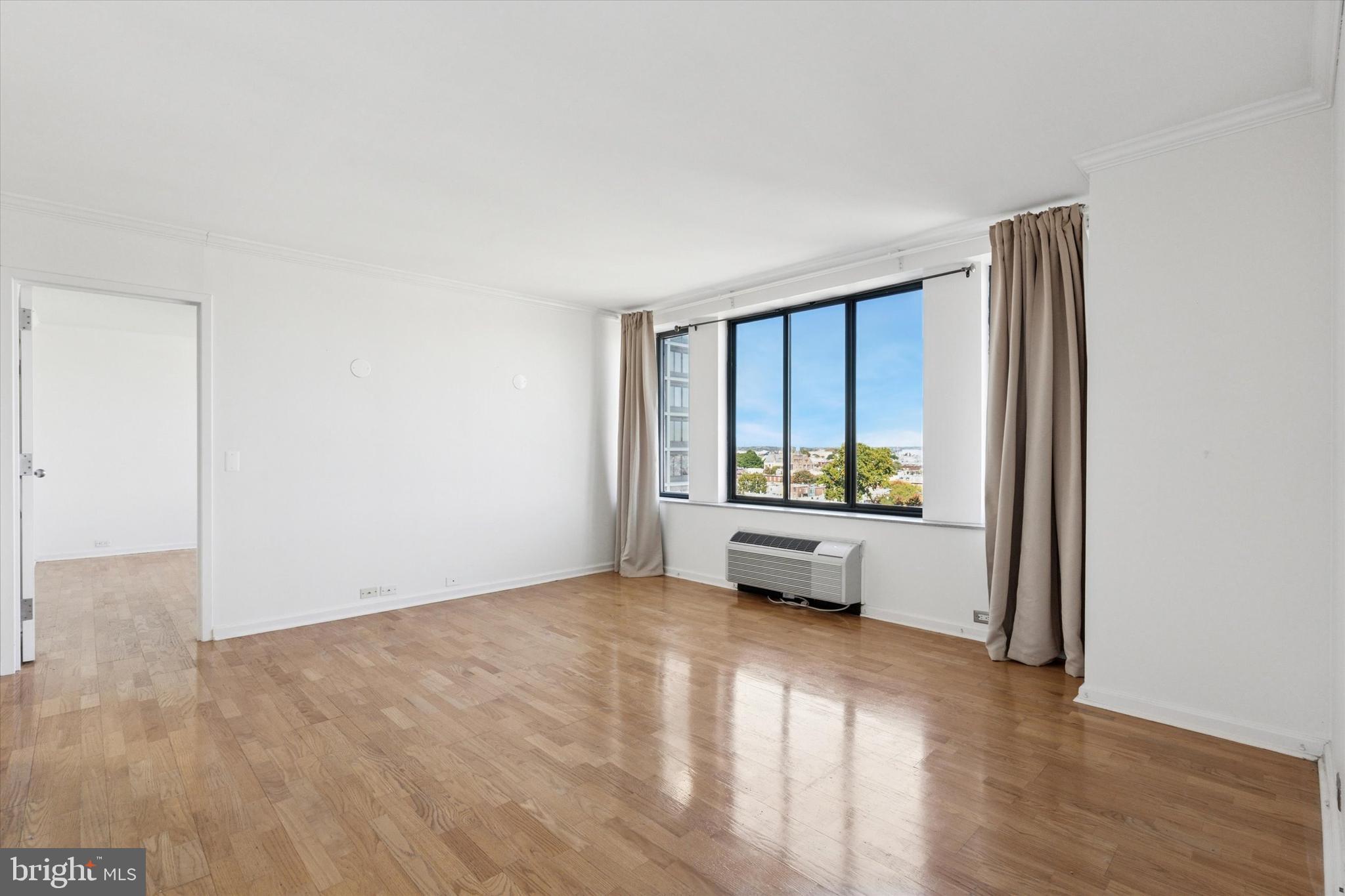 2001 Hamilton Street, Unit 1205 Philadelphia, PA 19130 - Photo 3 of 34 a view of a living room hardwood and a window