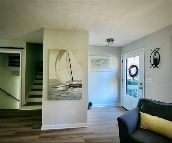 a view of livingroom with furniture and wooden floor
