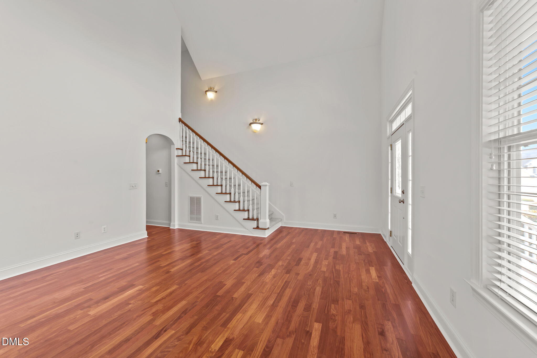 7101 Numa Circle Willow Spring, NC 27592 - Photo 6 of 44 a view of a hallway with wooden floor and staircase
