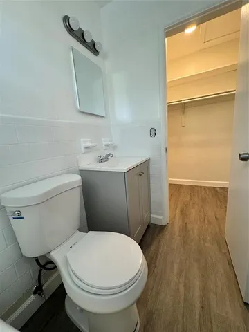 a bathroom with a toilet and a sink