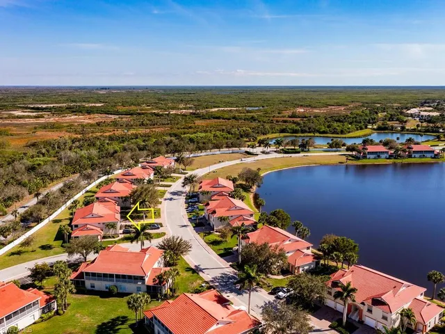 an aerial view of a house with outdoor space