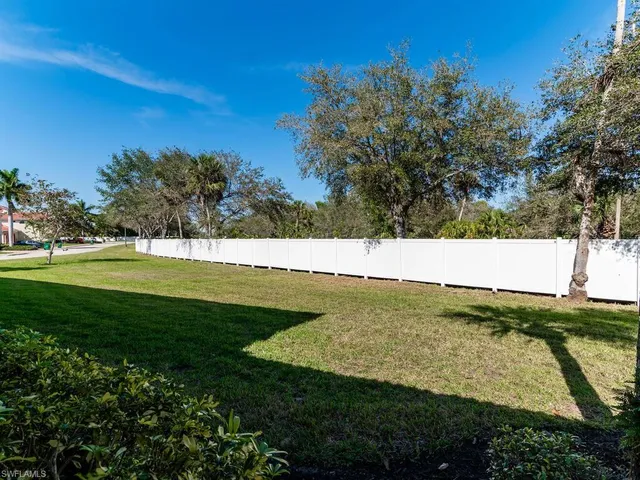 a view of swimming pool with a yard