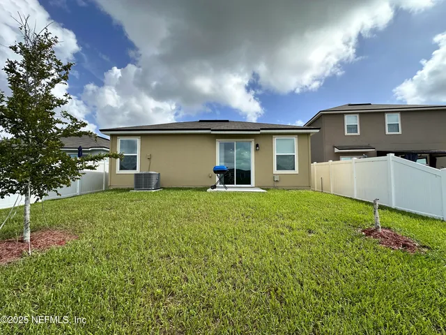 a house view with a garden space