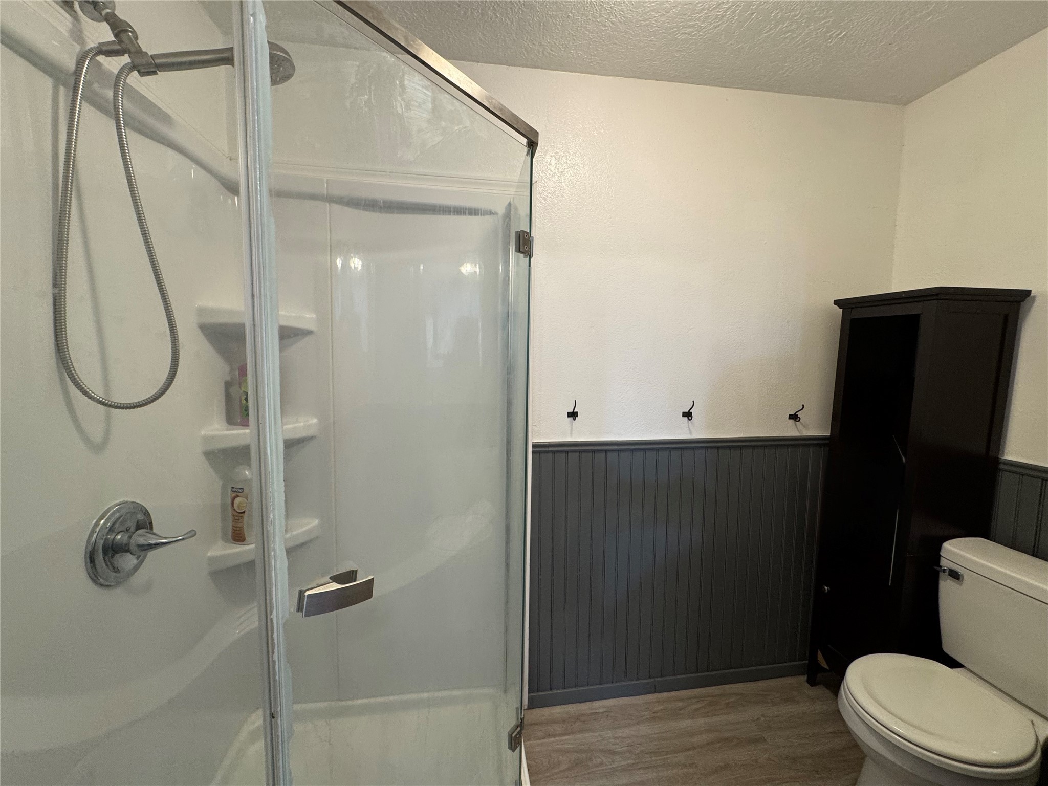 505 North 6th Street Silsbee, TX 77656 - Photo 22 of 35 a bathroom with a glass shower door