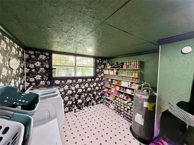 a view of a storage & utility room with washer and dryer