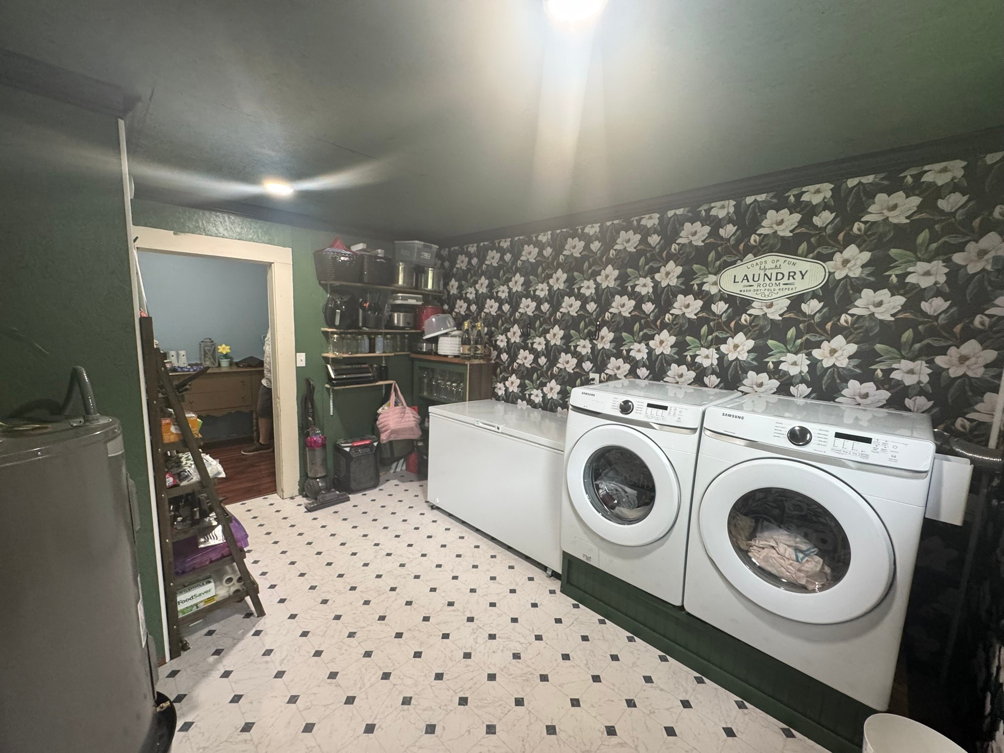 505 North 6th Street Silsbee, TX 77656 - Photo 28 of 35 a view of a storage & utility room with washer and dryer