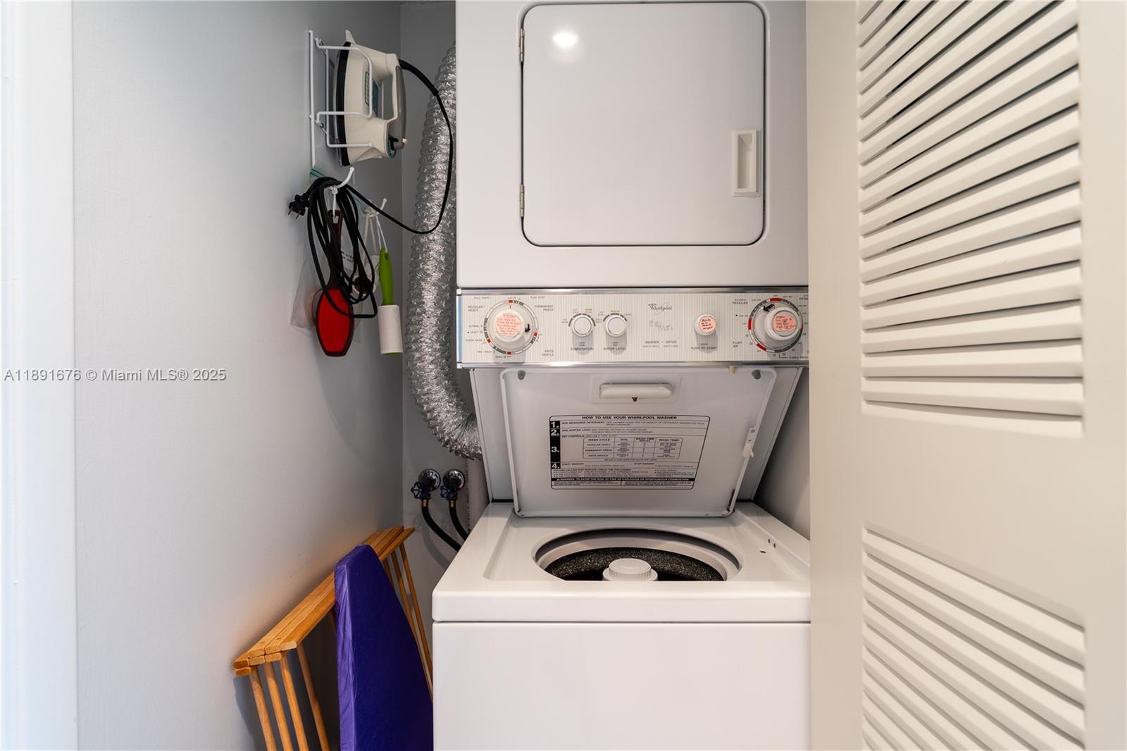 13700 Southwest 11th Street, Unit 309A Pembroke Pines, FL 33027 - Photo 11 of 31 a utility room with dryer and washer