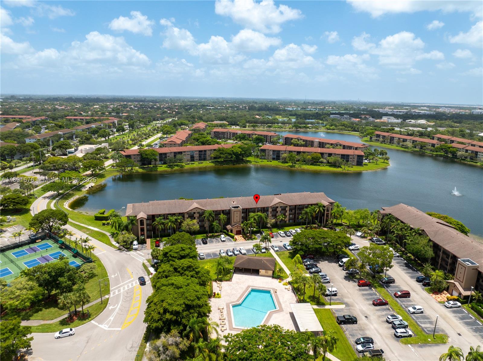 13700 Southwest 11th Street, Unit 309A Pembroke Pines, FL 33027 - Photo 2 of 31 an aerial view of residential houses with outdoor space
