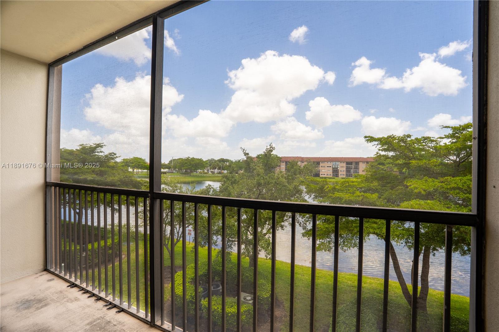 13700 Southwest 11th Street, Unit 309A Pembroke Pines, FL 33027 - Photo 21 of 31 a view of a city view from a balcony