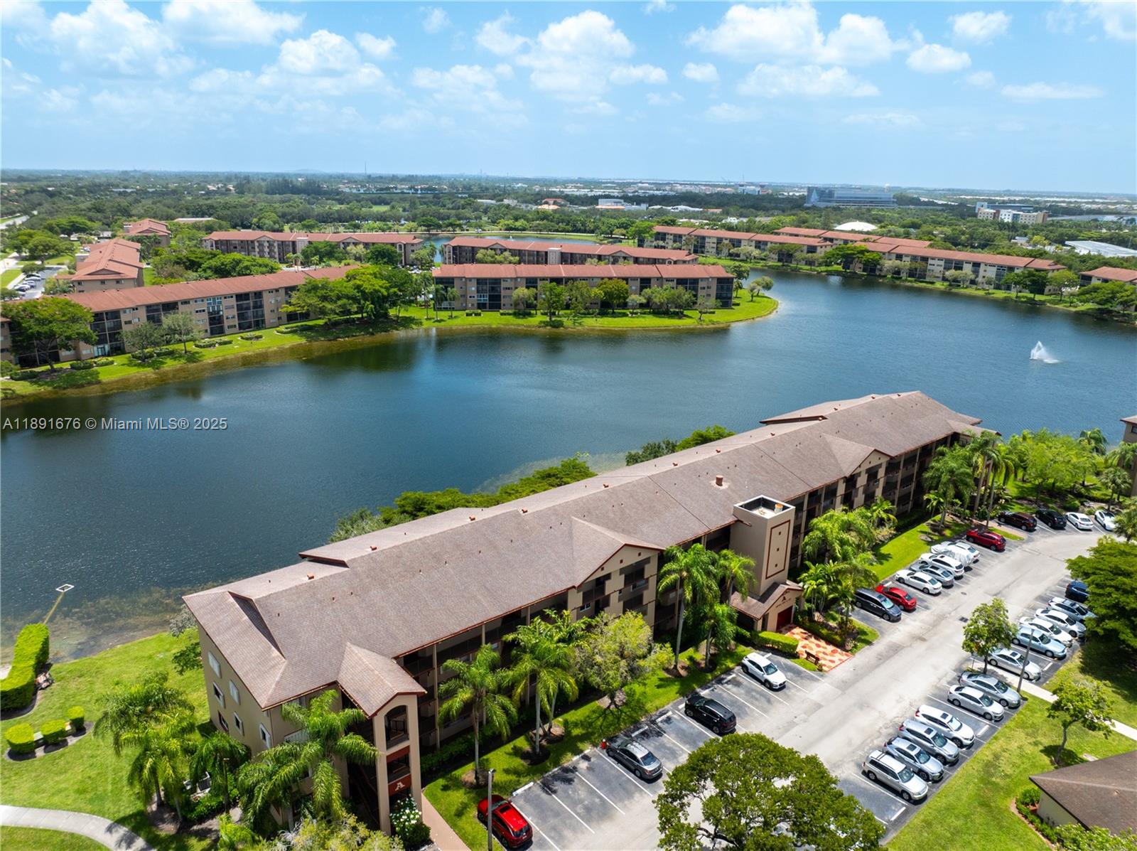 13700 Southwest 11th Street, Unit 309A Pembroke Pines, FL 33027 - Photo 3 of 31 an aerial view of a house with a lake view