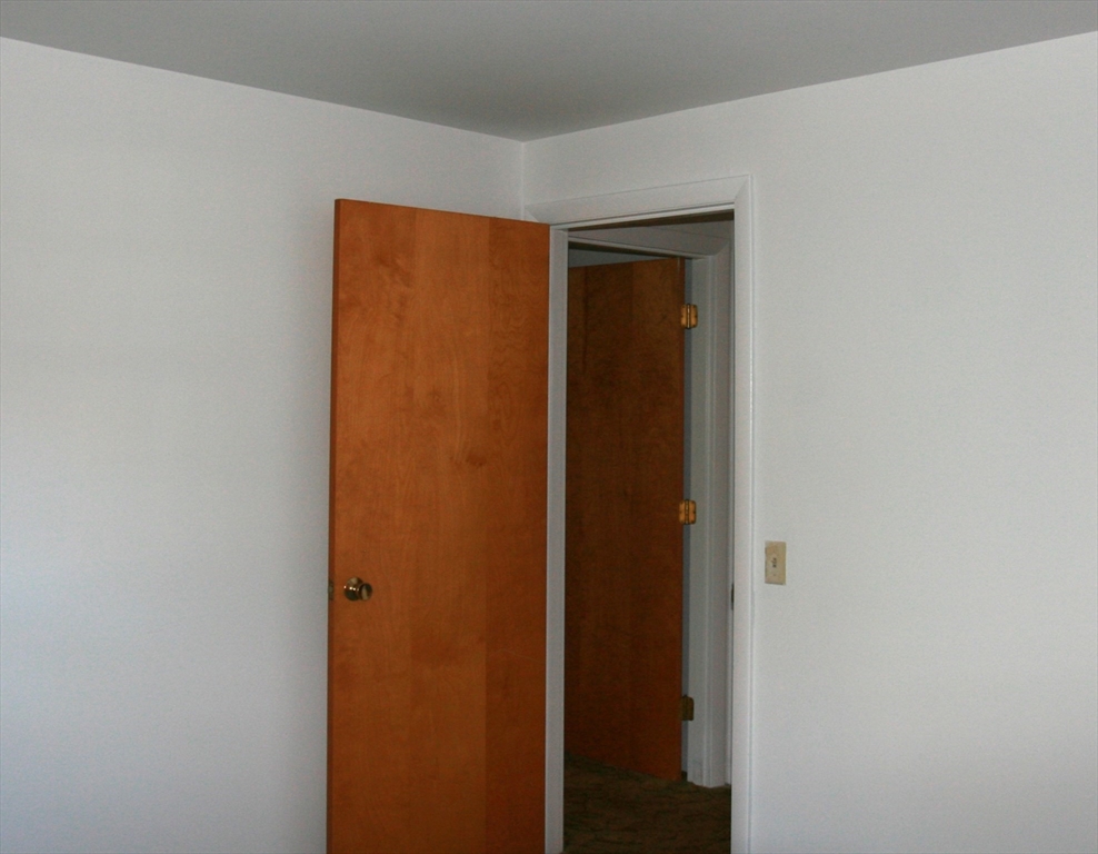 19 Oriole Lane Barnstable, MA 02648 - Photo 18 of 40 a door with a hallway to the house