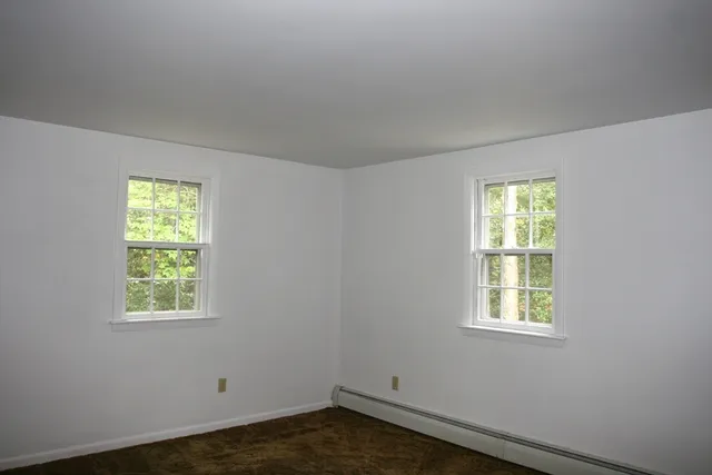 an empty room with windows