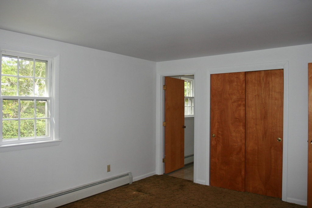 19 Oriole Lane Barnstable, MA 02648 - Photo 24 of 40 an empty room with windows